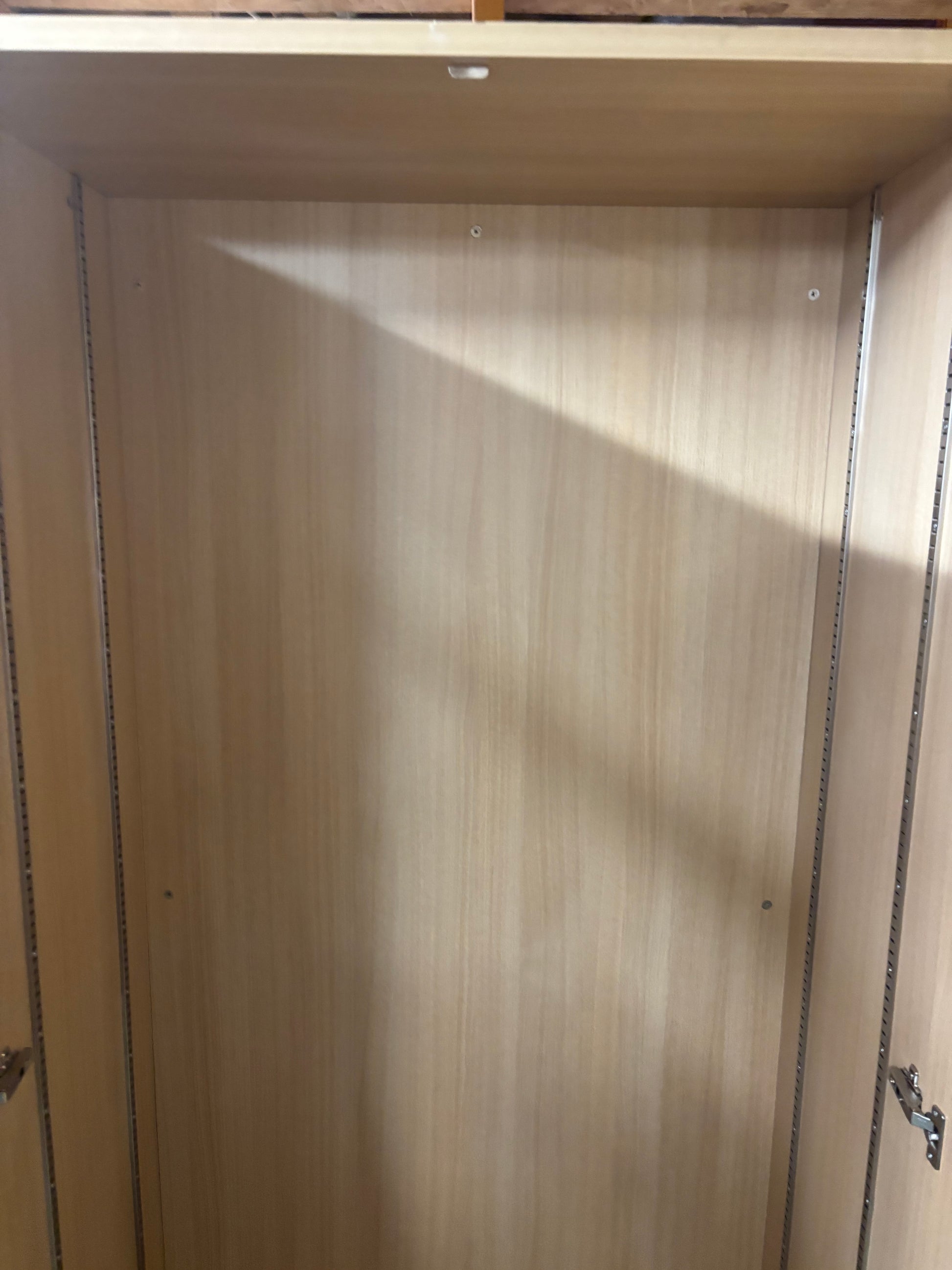 Tall 2 door storage unit with internal shelves in white oak laminate 200Hx100Wx50D  J3914