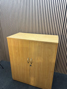 Medium 2 door oak laminate storage unit with internal metal shelves and handles. 120Hx102Wx55D  J3920