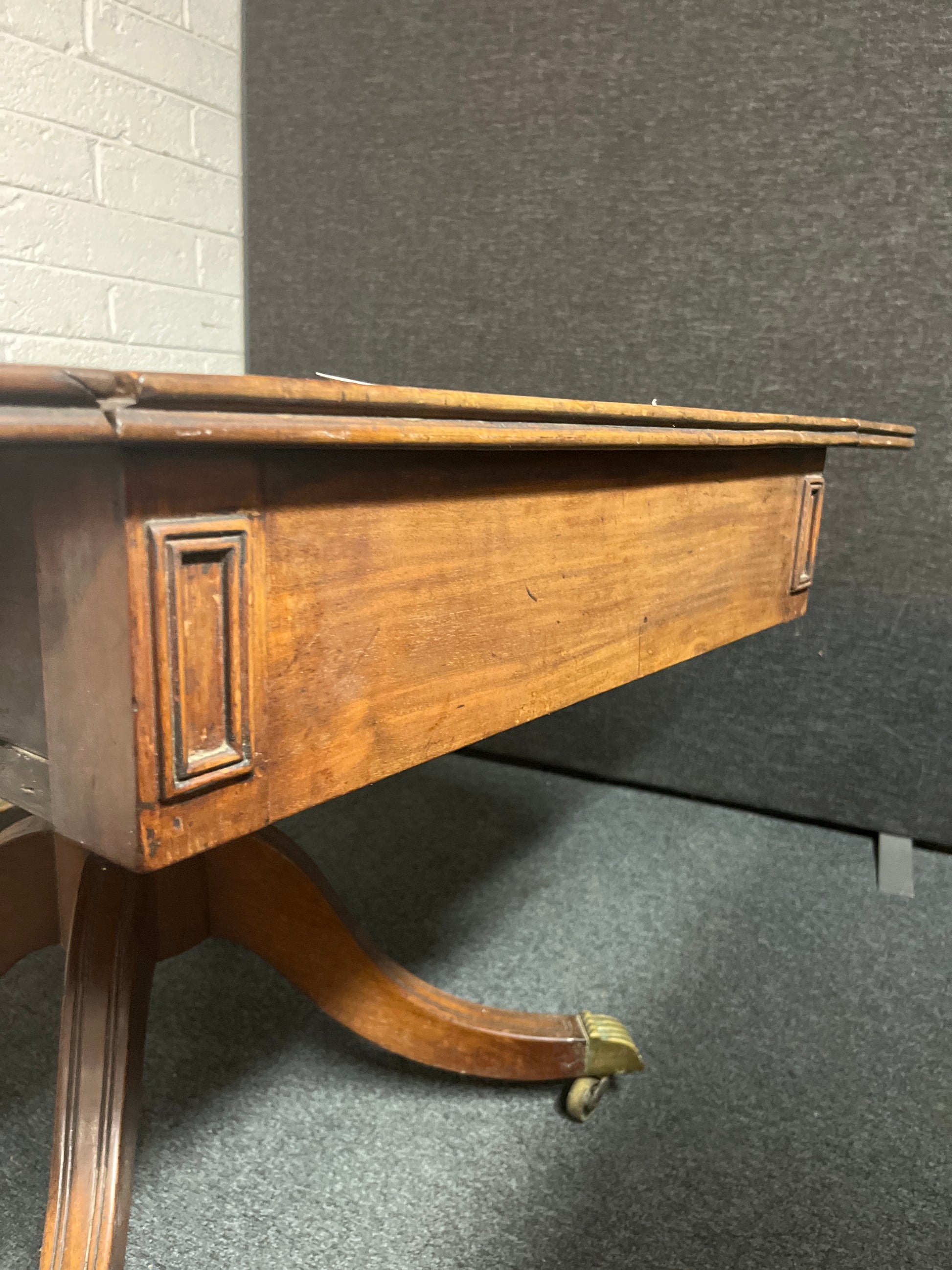 Mahogany stained ornate drop leaf dining table on castors W1270xL1250xH730 3225