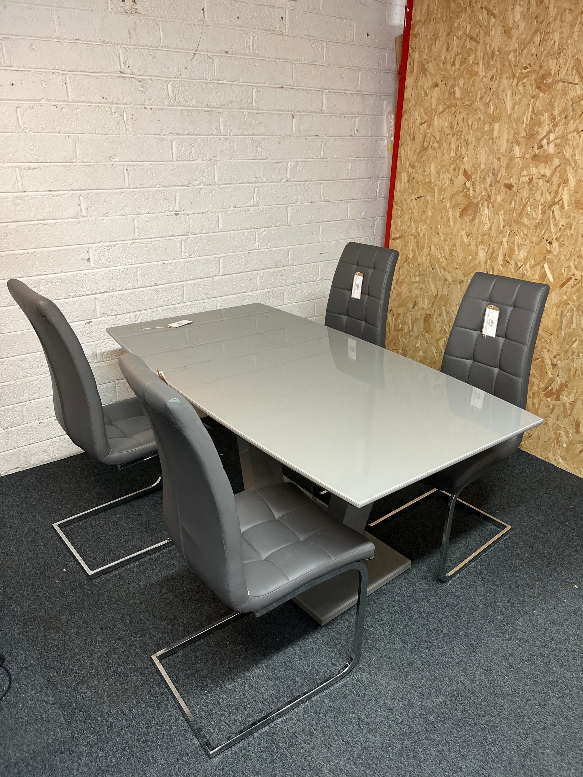 Grey glass top rectangular dining table (W 160 x D 90 cm) and 4 grey leatherette metal framed dining chair 1325