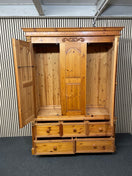 Large solid pine wardrobe featuring three doors and five drawers (207cm high 150 wide 57 deep )  44612