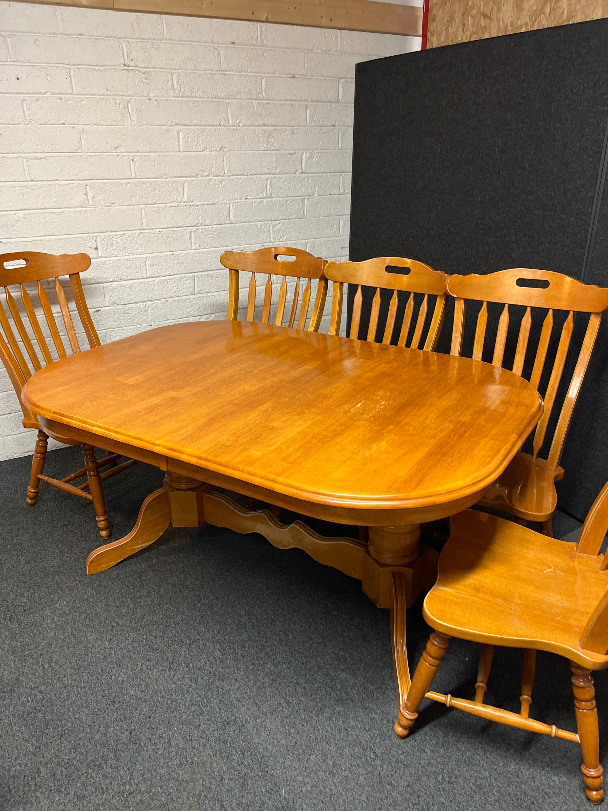 Large hardwood oval extendable dining table (L 155 - 215 x W 105 cm) with 8 no. matching high back solid wood chairs 2225