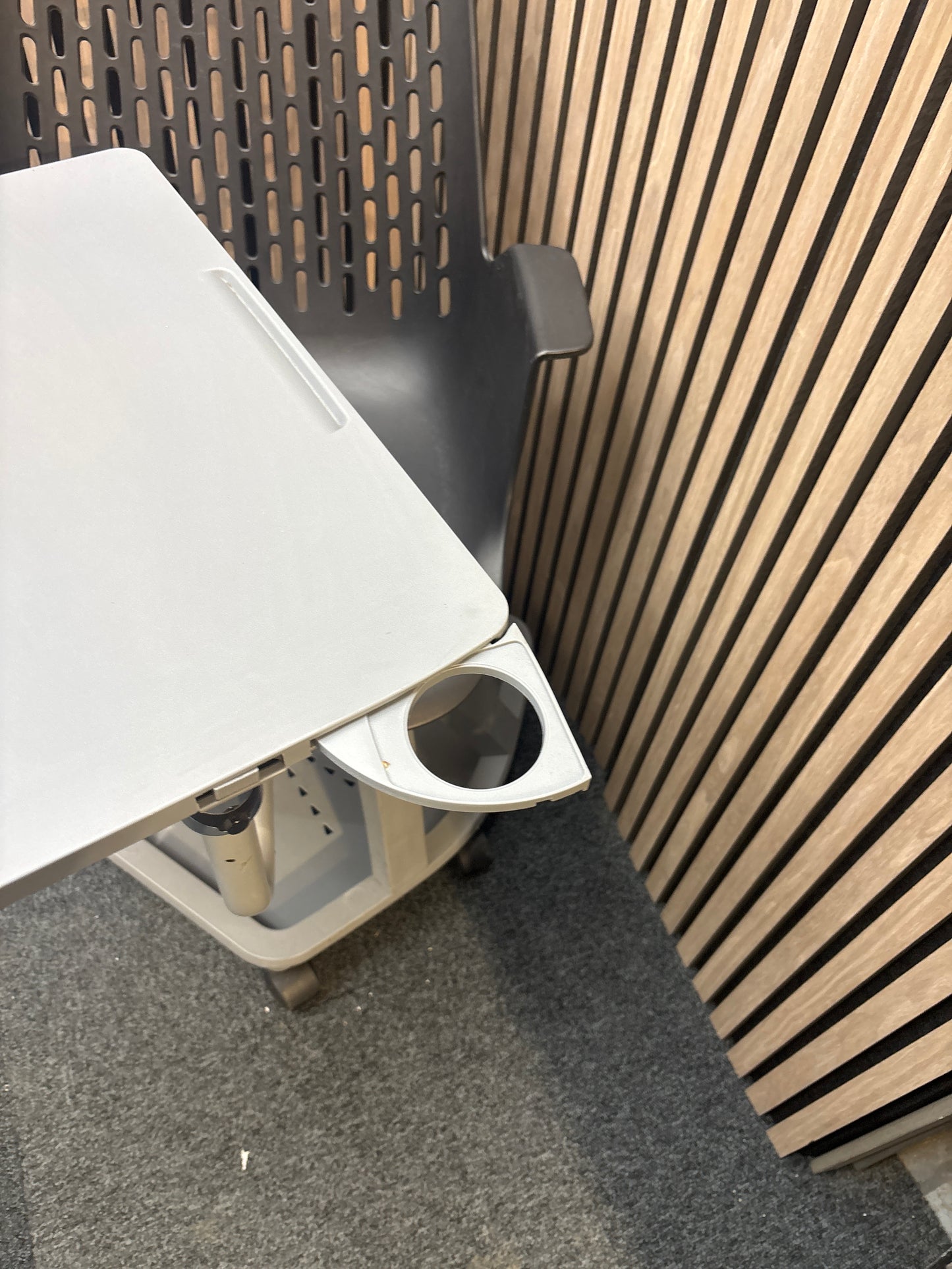 Report mobile conference chair with writing tablet on castors, black plastic seat, dark grey writing tablet with drinks holder. 90Hx64Wx59H. Seat height 445mm