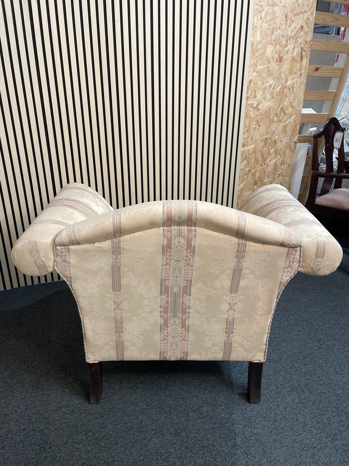 Ornate roll back stripped fabric armchair with castors 2425