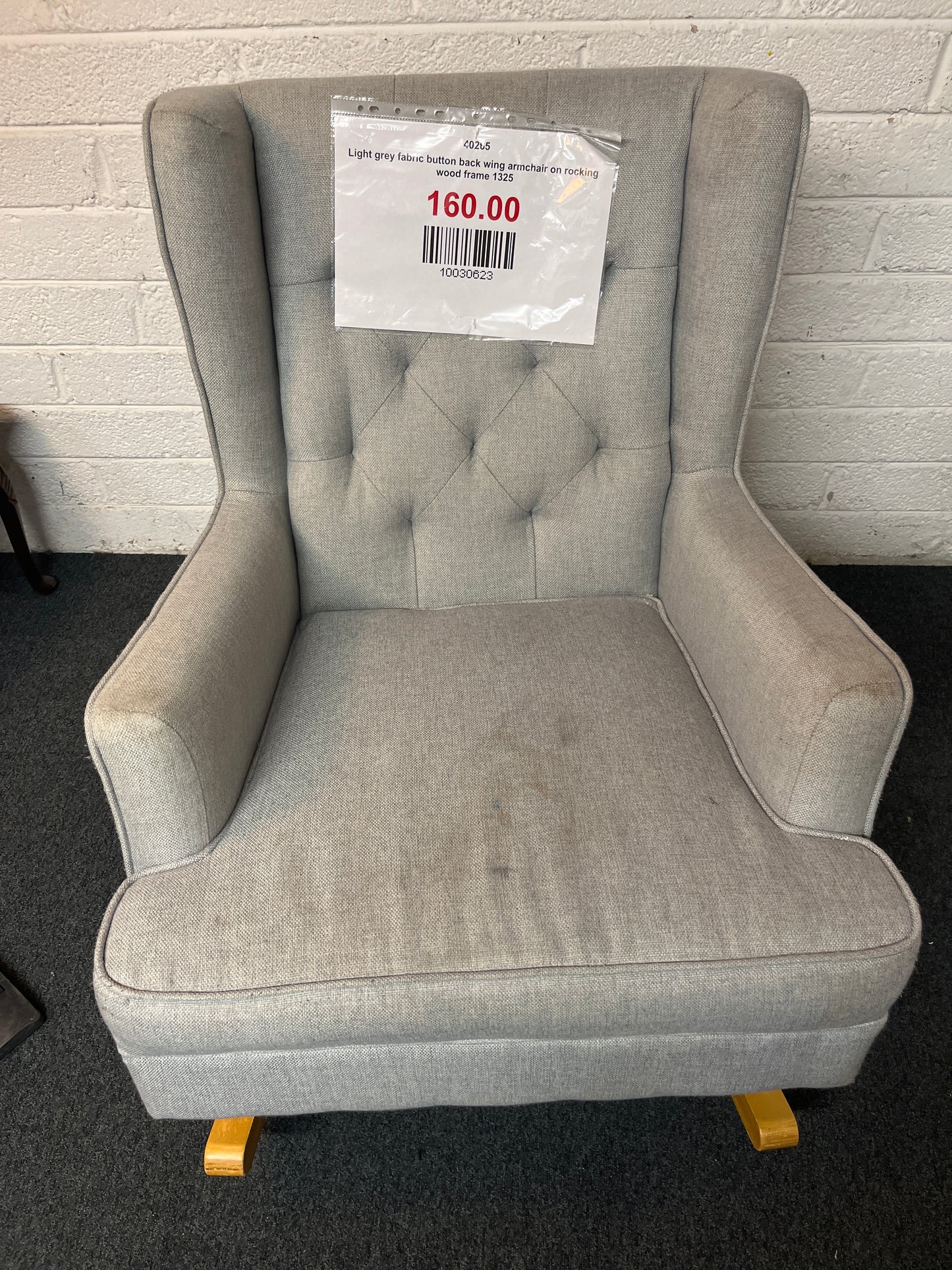 Light grey fabric button back wing armchair on rocking wood frame 1325