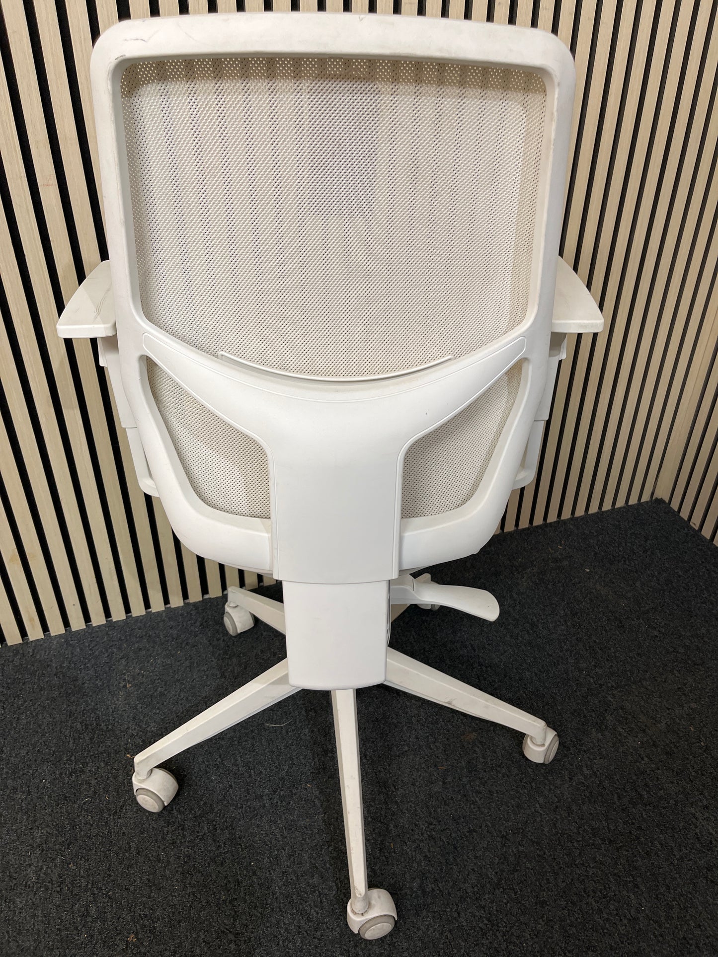 Orangebox mesh back, dark blue seat fabric swivel chair, metal 5 star base on castors. Add Add arms for €40.00 1425