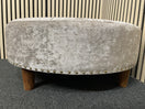 Large circular ottoman in grey velvet with button-tufted detailing.  44520