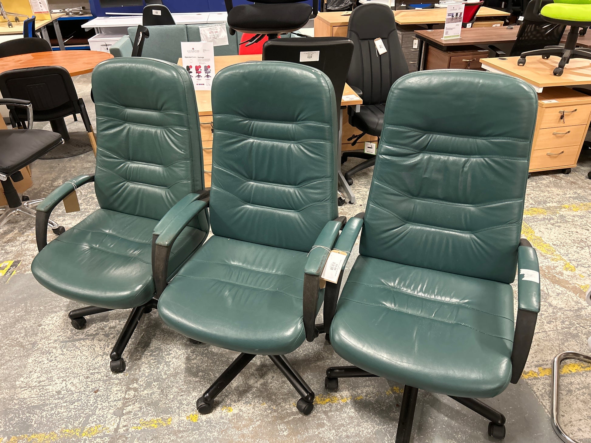 High back green leather swivel chair with arms