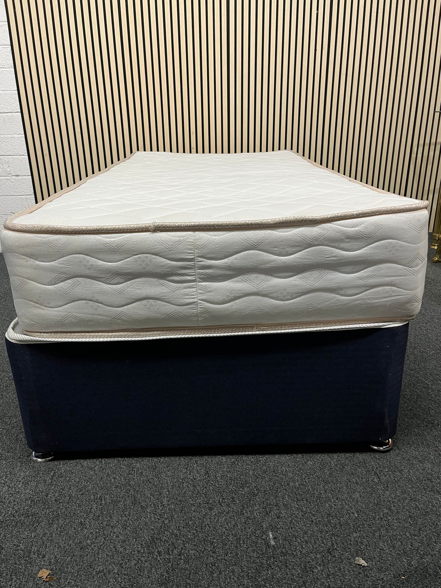 3ft secondhand divan base in navy fabric with castors