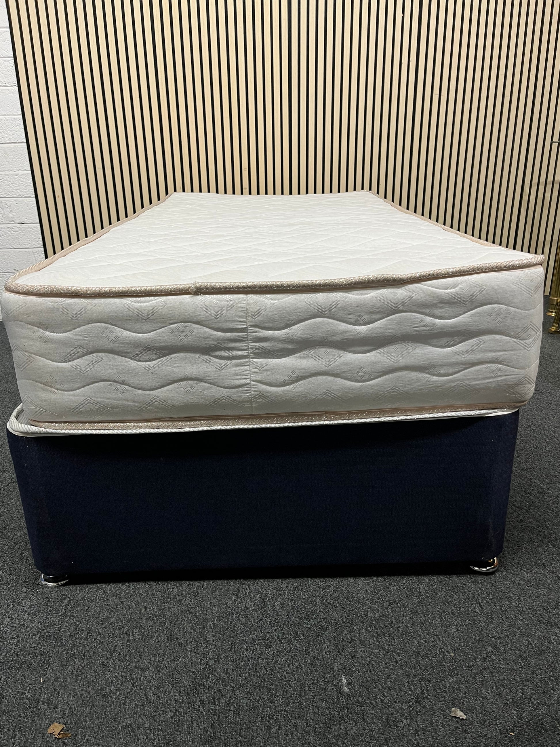 3ft secondhand divan base in navy fabric with castors