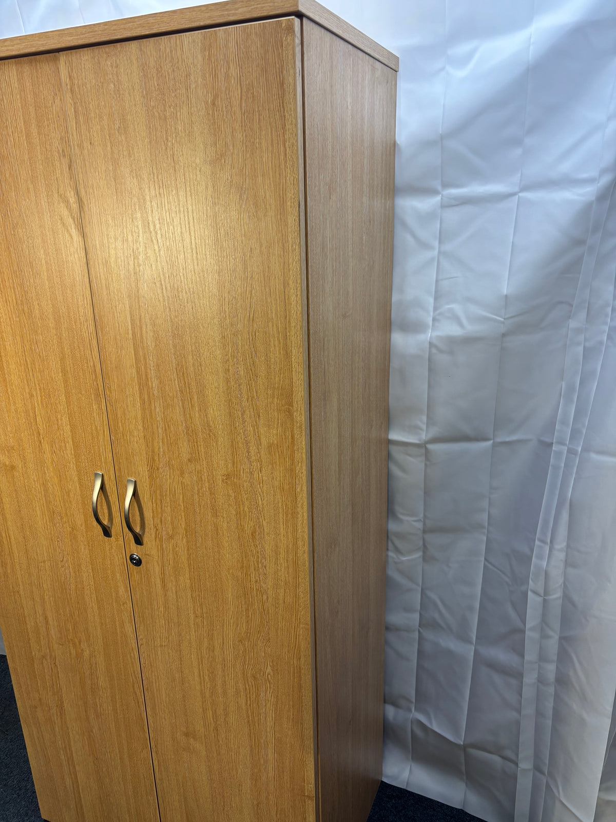 Tall oak 2 door storage unit with internal wooden shelves and key 180Hx47Dx80W  J3927