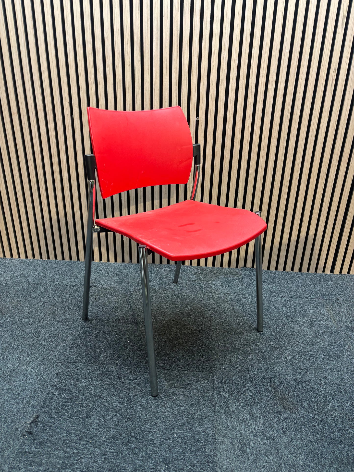 Boss design dream Red plastic framed stacking chair, chrome frame