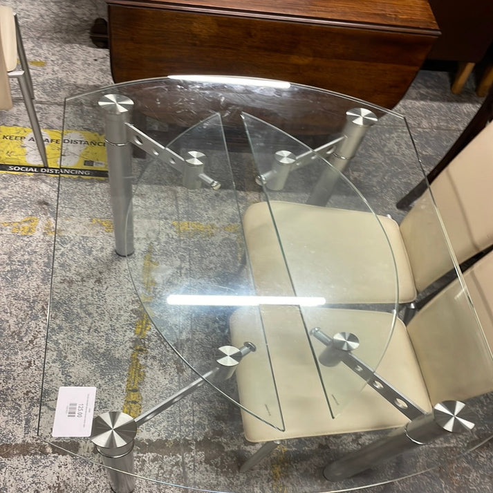 Circular extendable glass and chrome kitchen table CJM Furniture