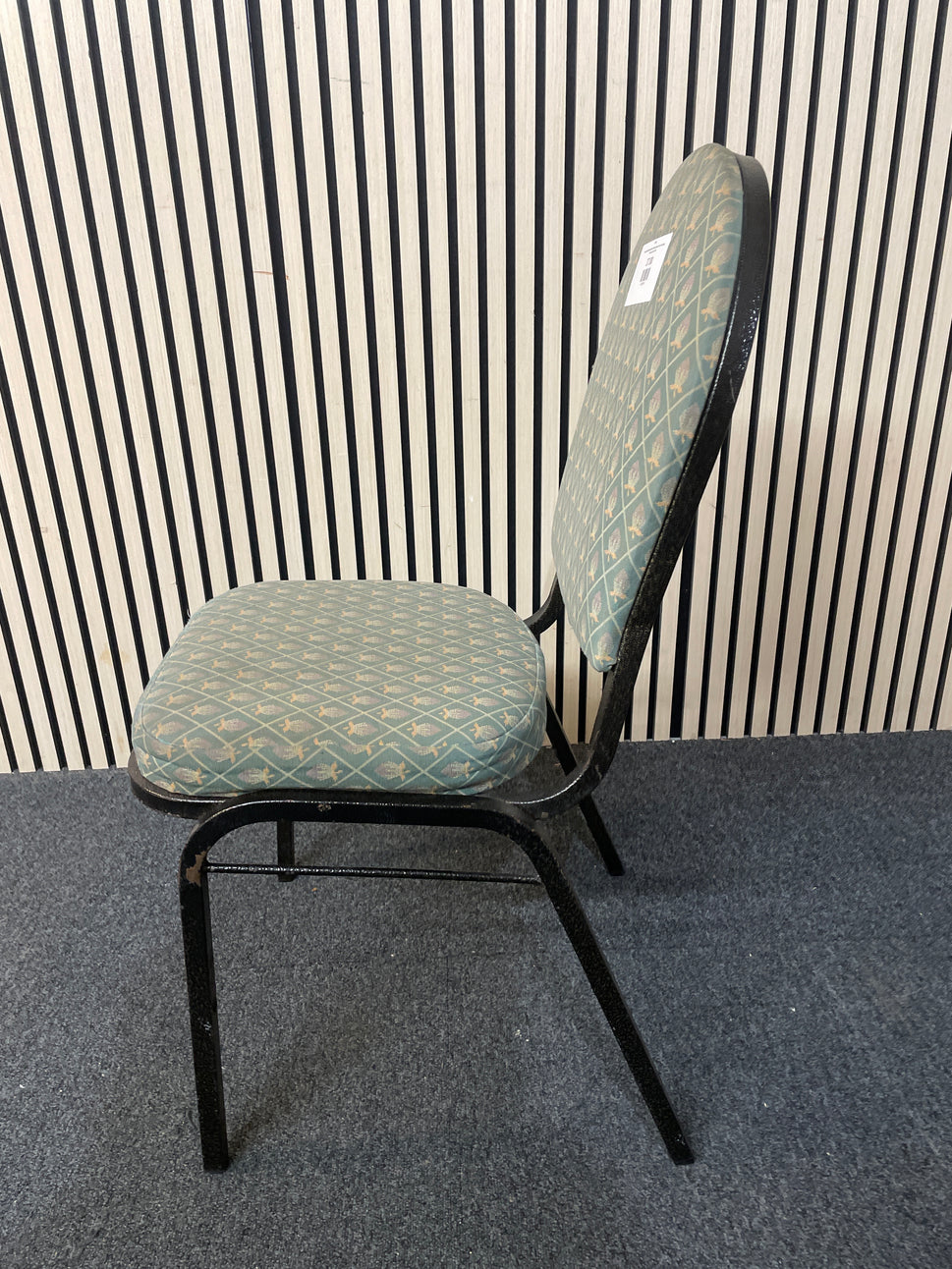  black metal framed green fabric seat and back stacking banquet chair 2425