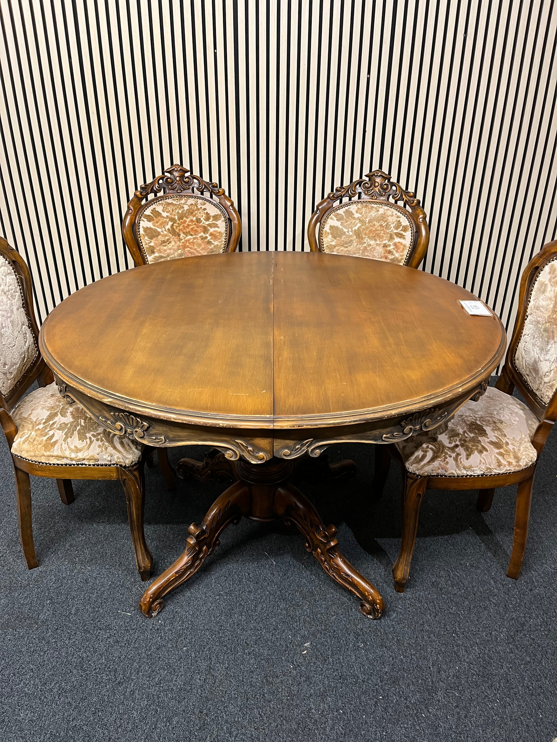 Ornate dark wood dining table with central column base 6 matching darkwood framed floral fabric seats  2325