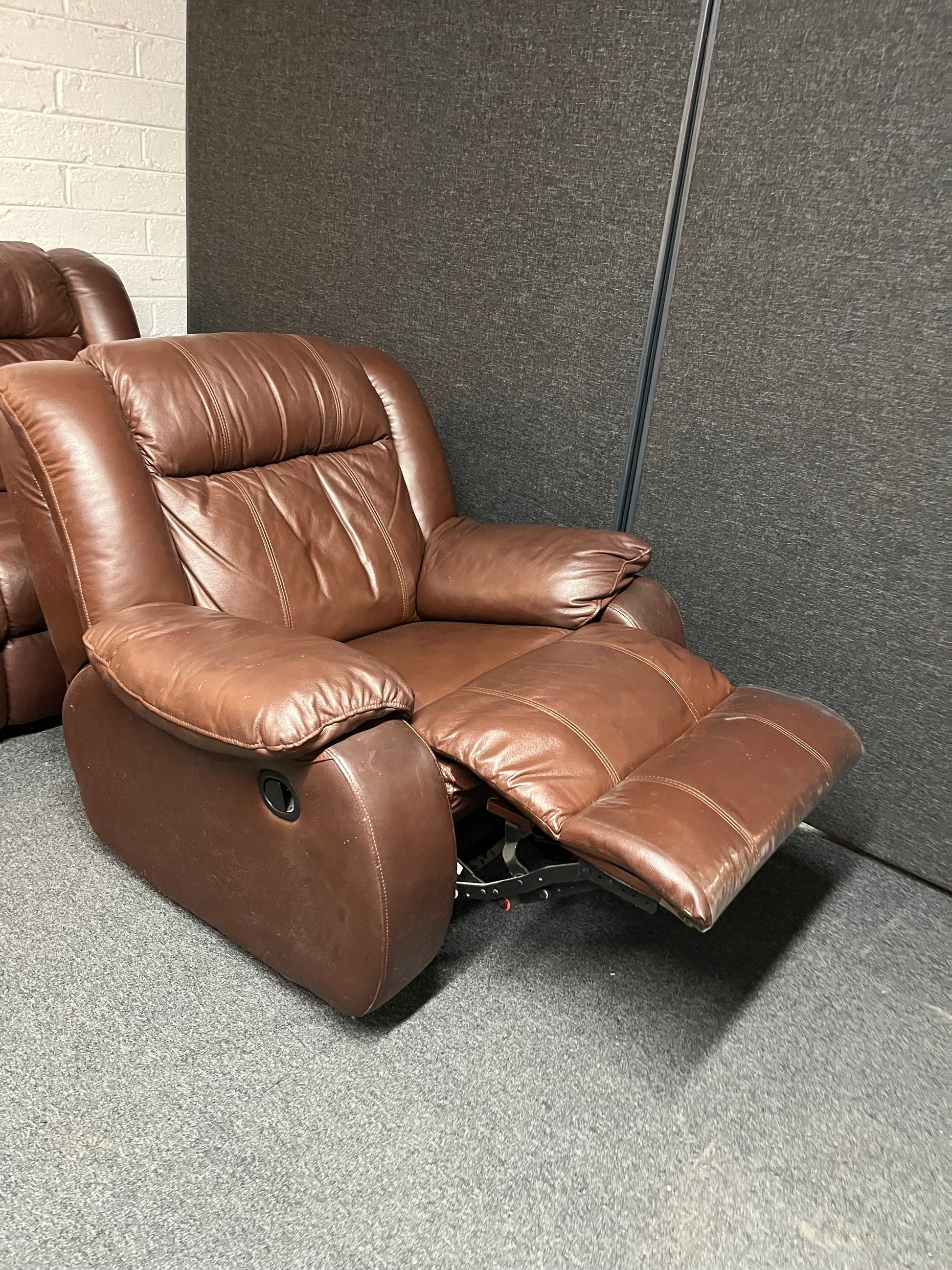 Dark brown leather 2 seater and matching rocking recliner armchair 2225