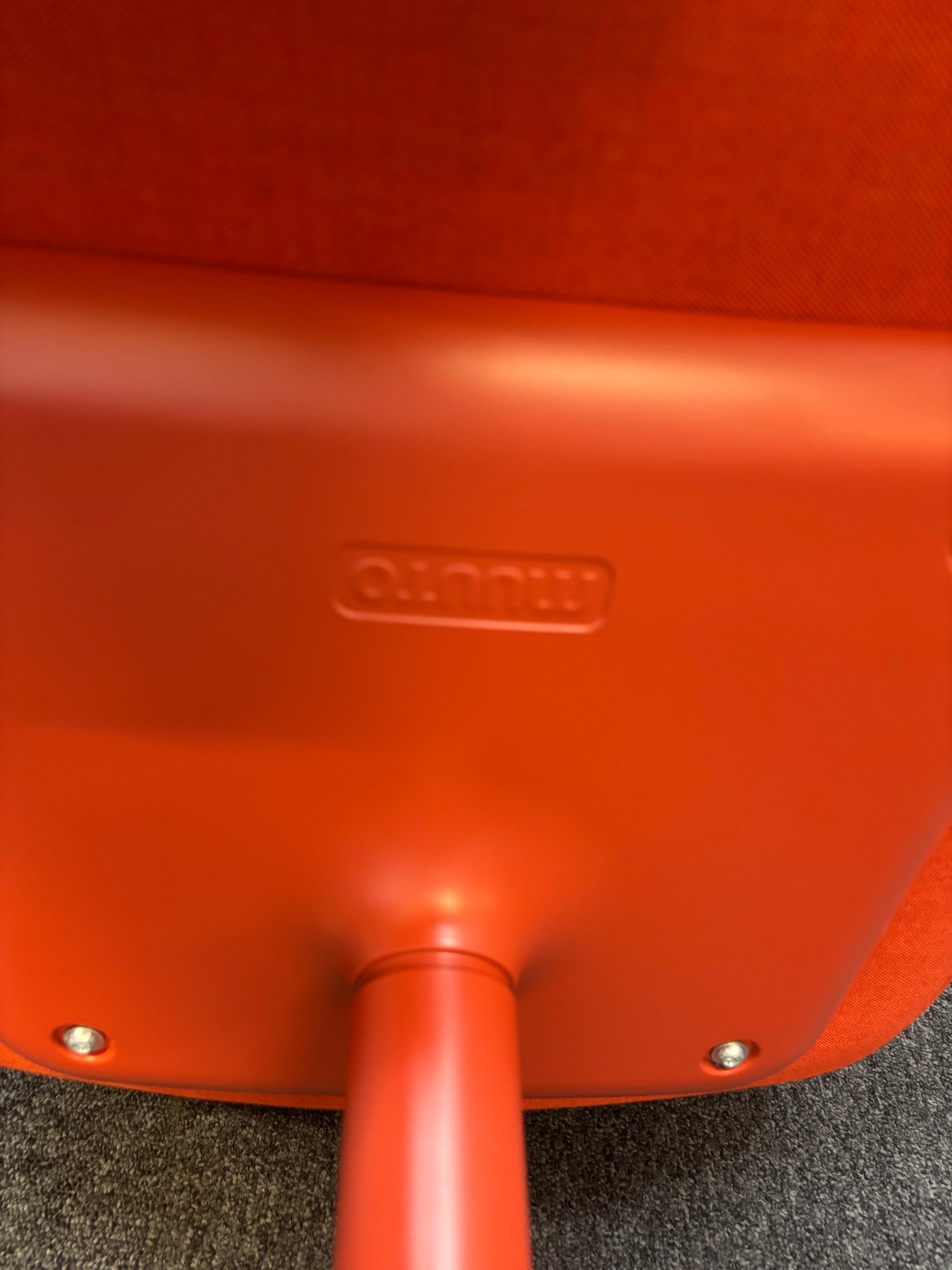 Muuto fibre armchair with a swivel base in manner 2 fabric with red painted metal spider base   J3911