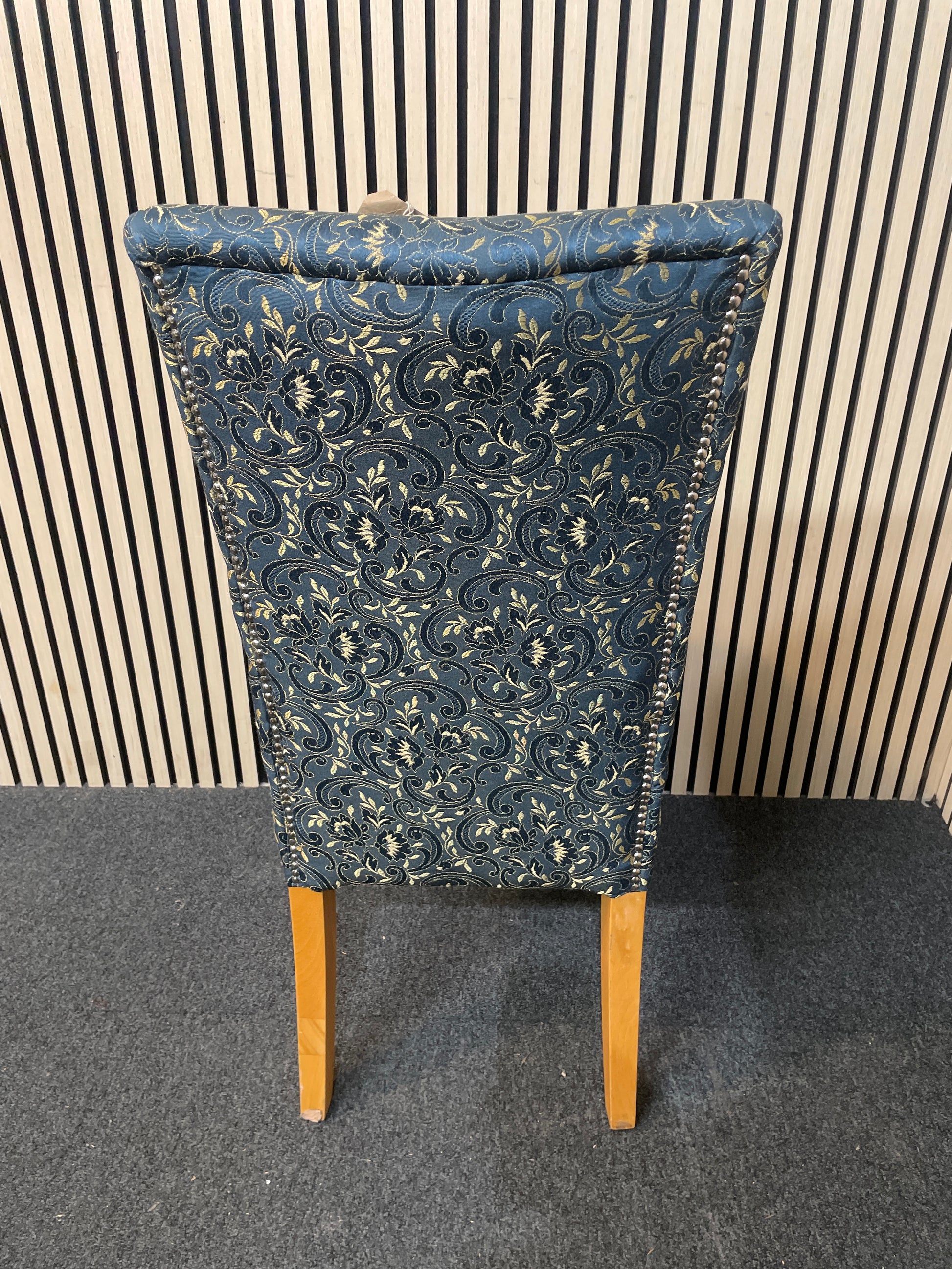 Dark blue and gold fabric floral design dining chair with pin detail
