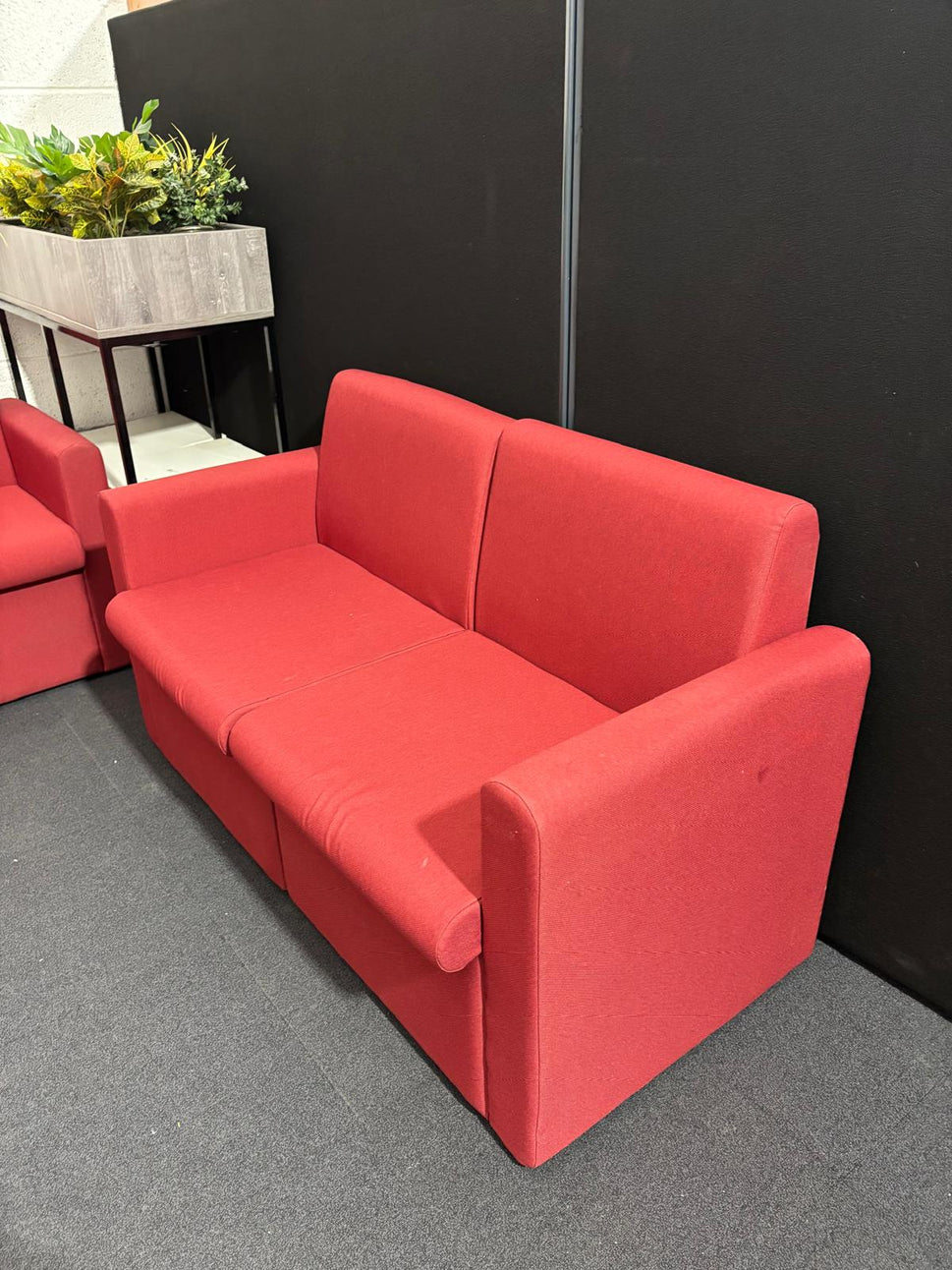 Una modular soft seating L shape sofa + 2 seater with matching coffee table in soft red fabric