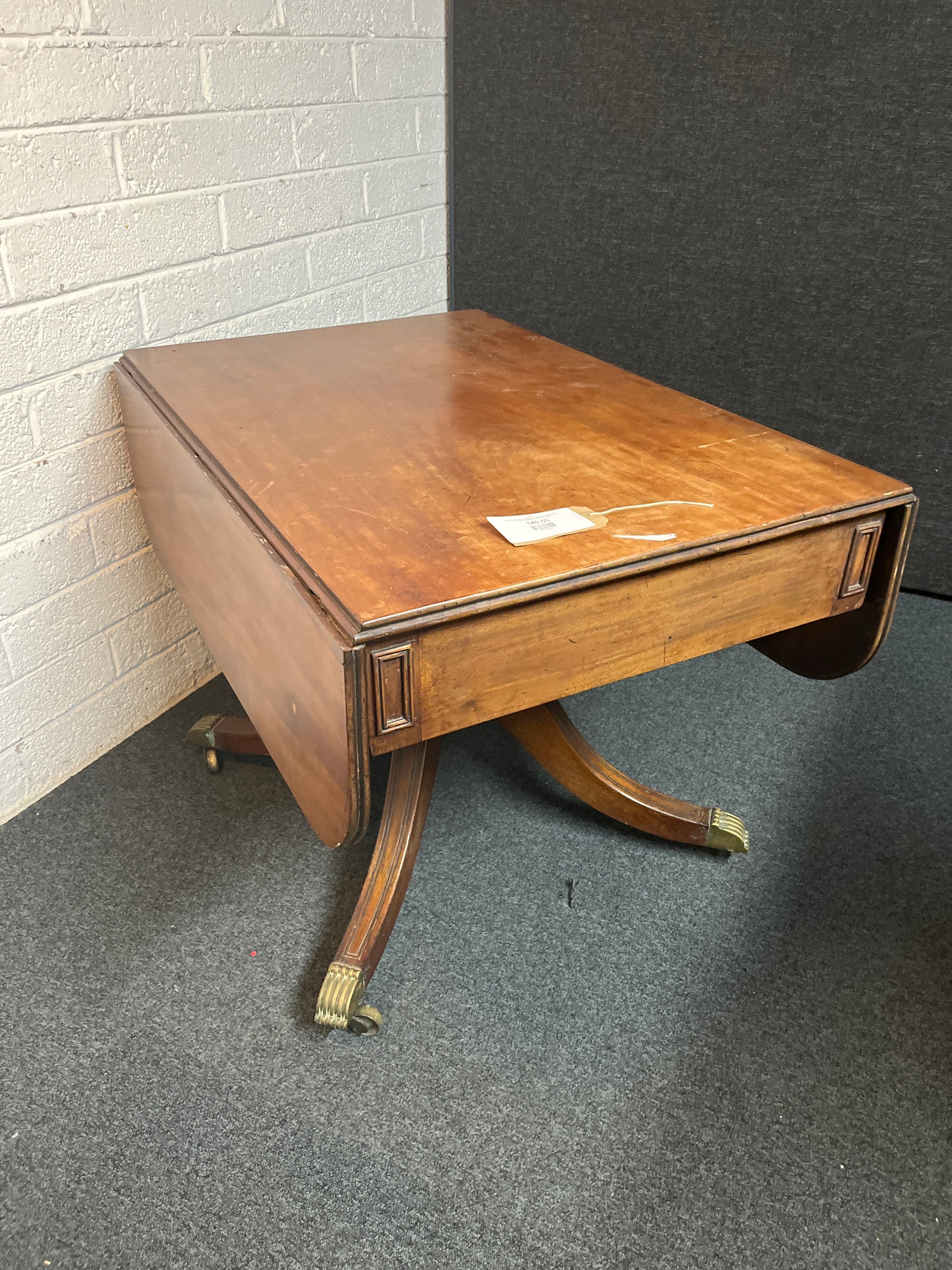 Mahogany stained ornate drop leaf dining table on castors W1270xL1250xH730 3225