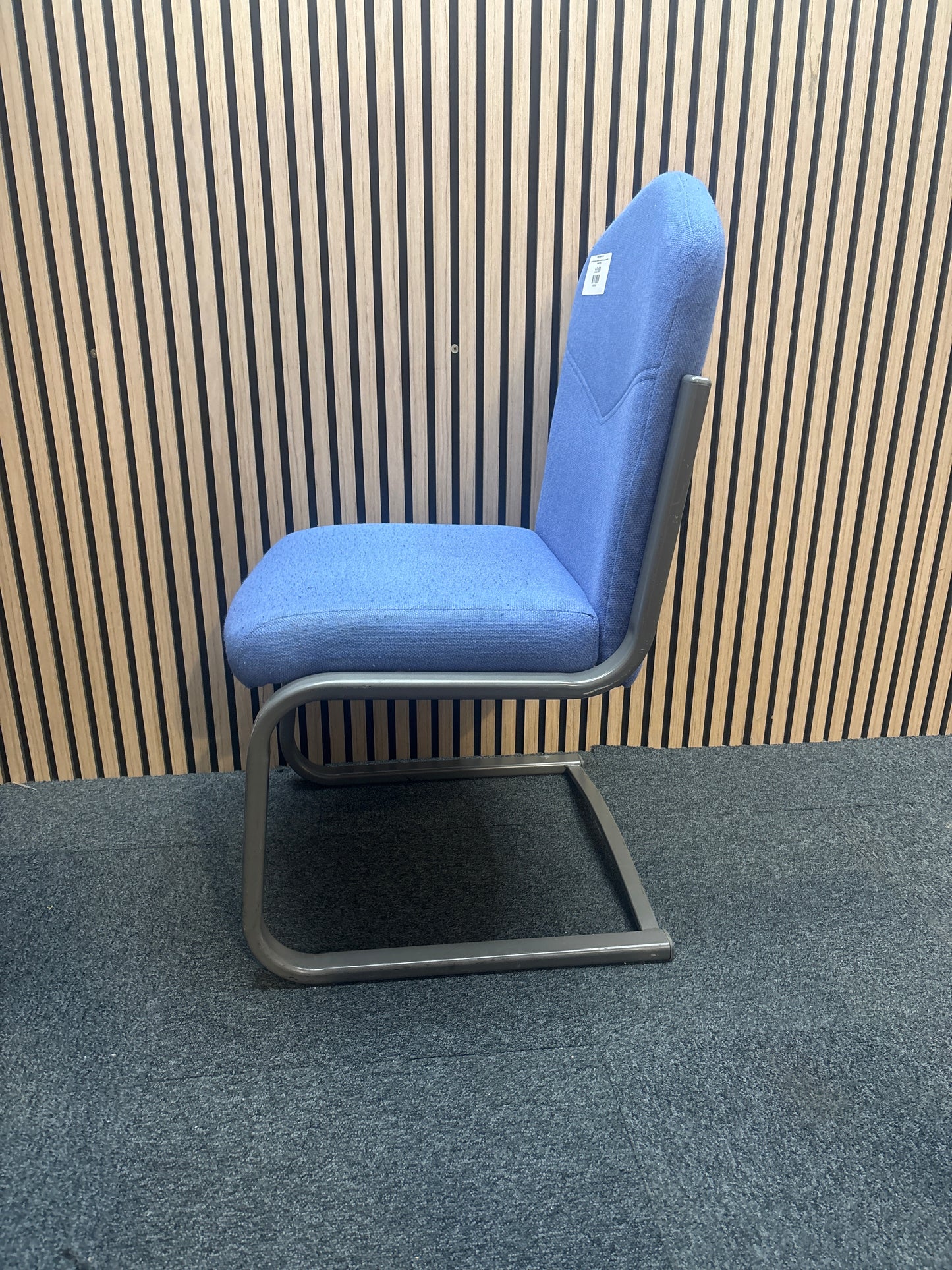 Light blue fabric cantilever meeting chair, grey powder coated frame