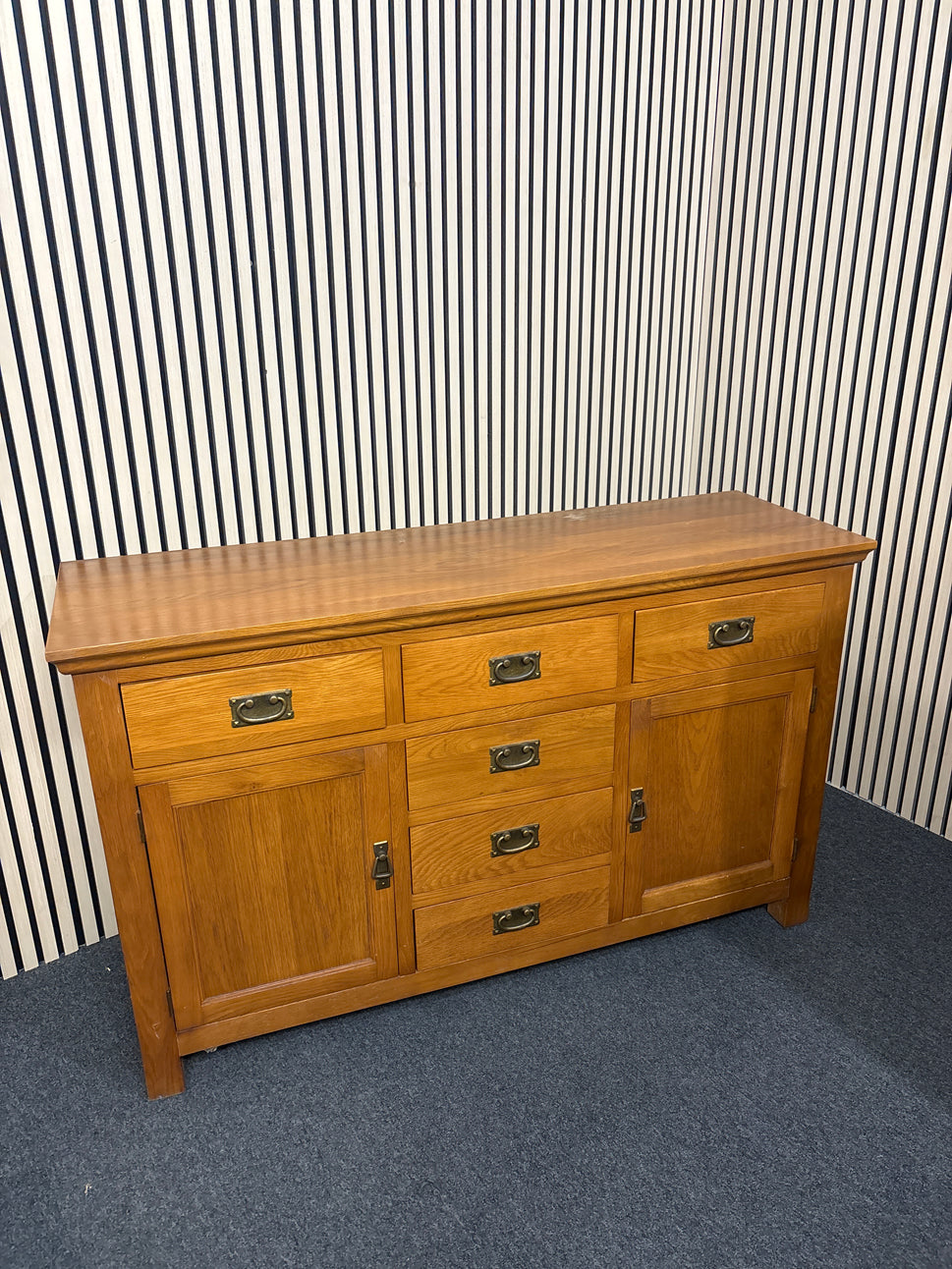 Solid oak stained 2 door 6 drawer sideboard(L x 140 W x 45 H x 85 cm) 3325