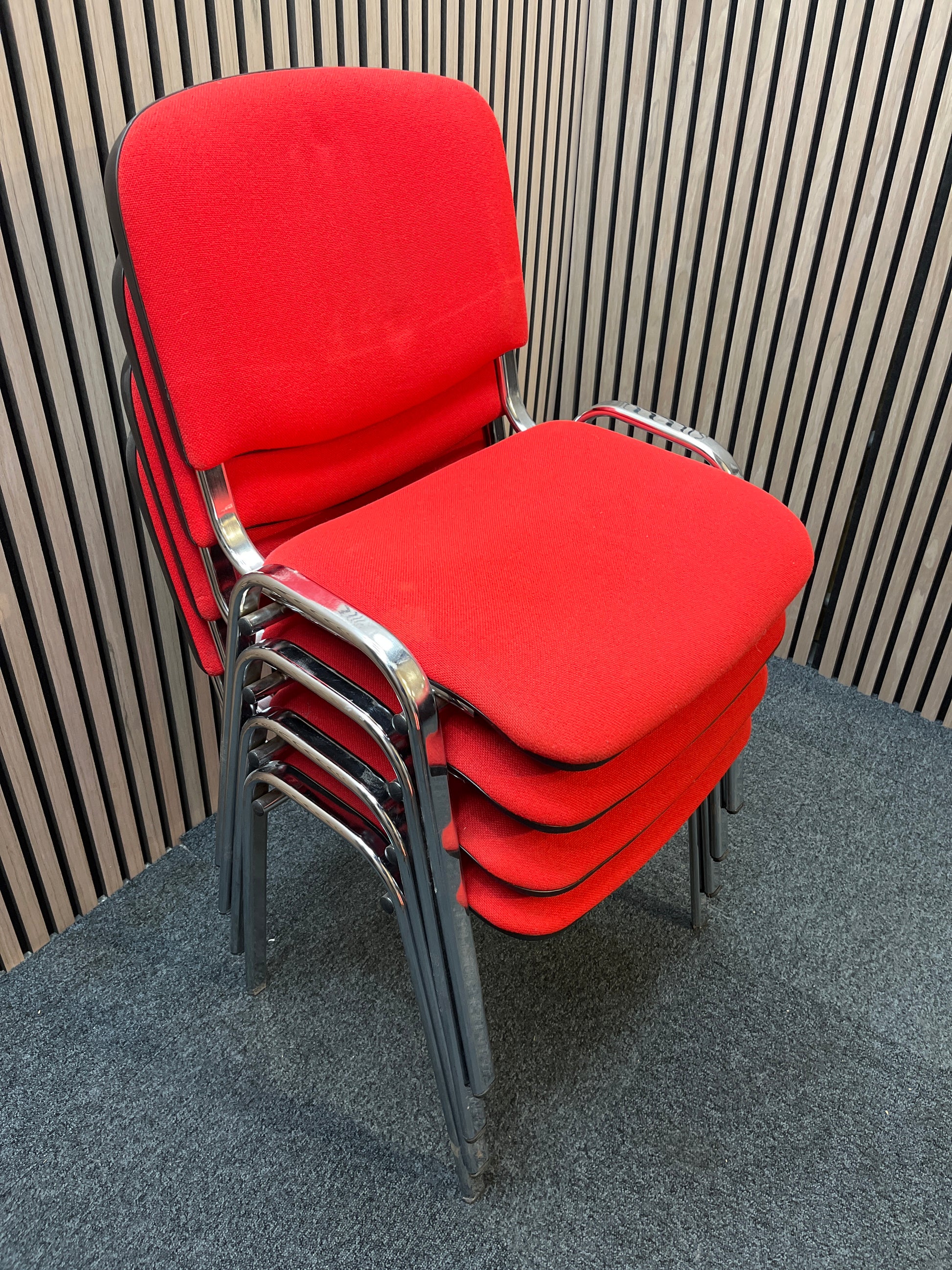 Red fabric stacking conference chair with chrome frame