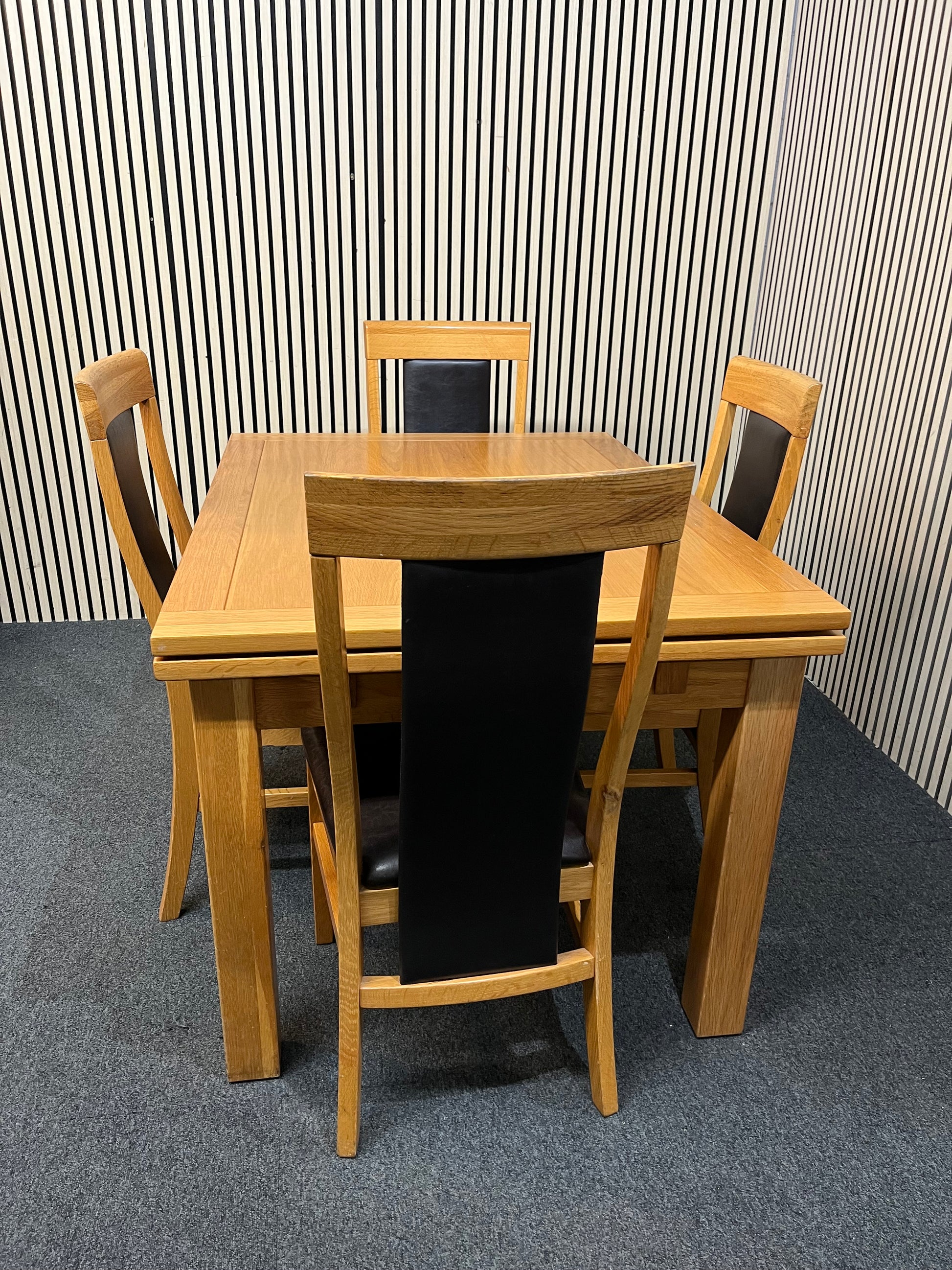 Solid oak extendable dining table (L 120 - 200 x W 90 cm) with 4 matching solid oak and black leather dining chairs  3126