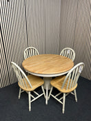 Round light wood dining table with four matching spindle chairs (diameter 105 cm + 45 cm extension)  44560