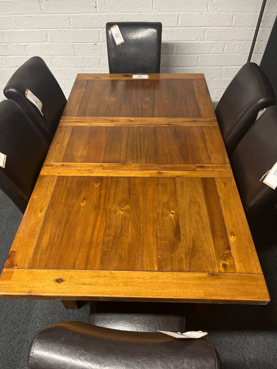 Large solid dark wood extendable kitchen table (W 1200 - 1600 x L 900 mm) with 6 no. high back black PU leatherette dining chairs 1225