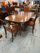 Switch Oval shaped mahogany extendable table on castors with matching  2 carver and 4 dining chairs with red fabric seat 2125 3 image