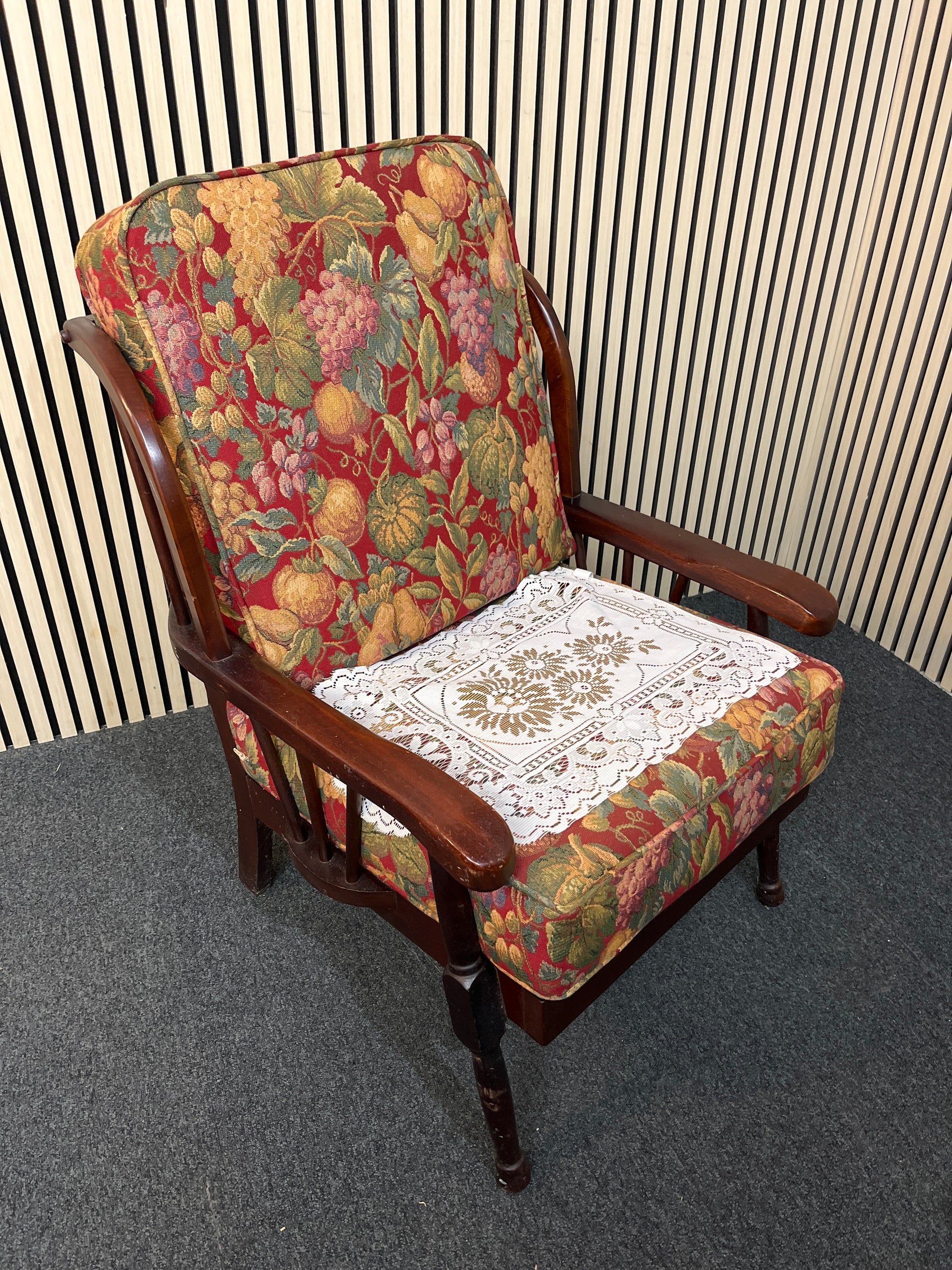 Dark wood stained fireside armchair with floral tapestry cushion 3325