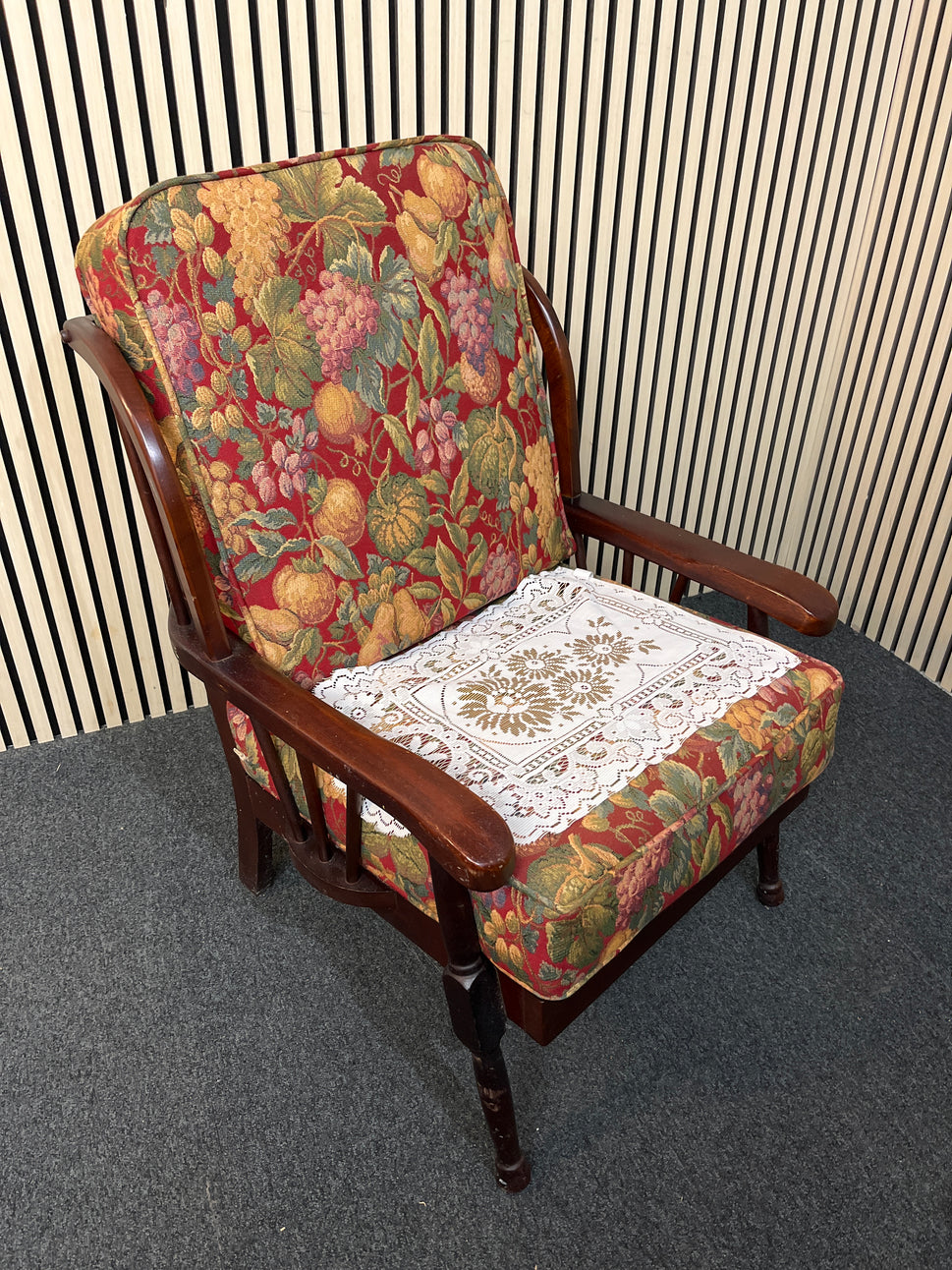 Dark wood stained fireside armchair with floral tapestry cushion 3325