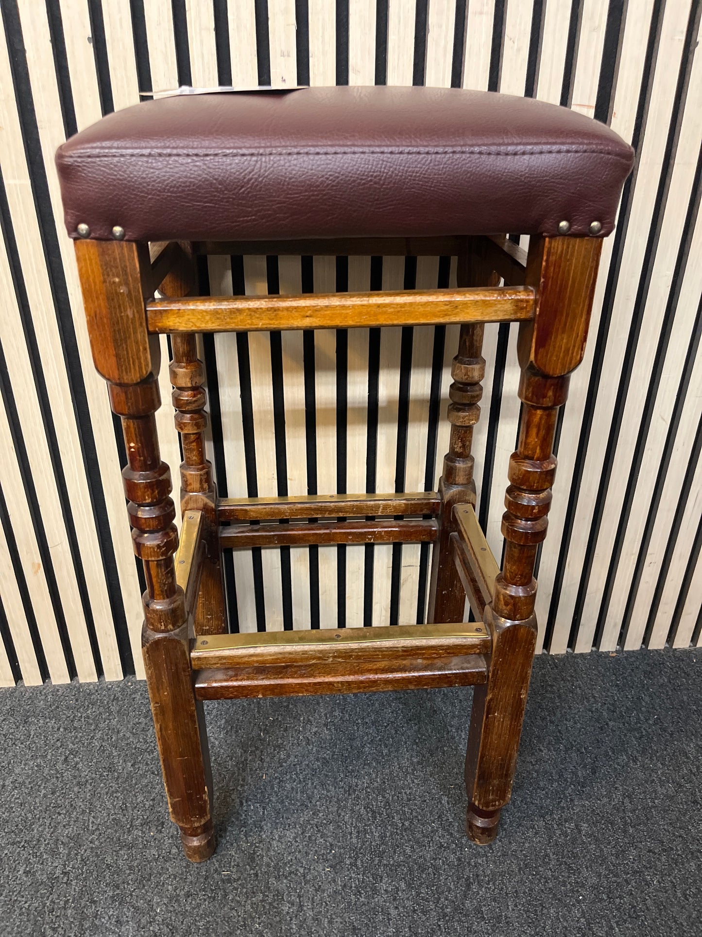 Tall solid dark wood stained square bar stools with brass footplates and wine vinyl seat fabric (Seat height 78 cm)  44237