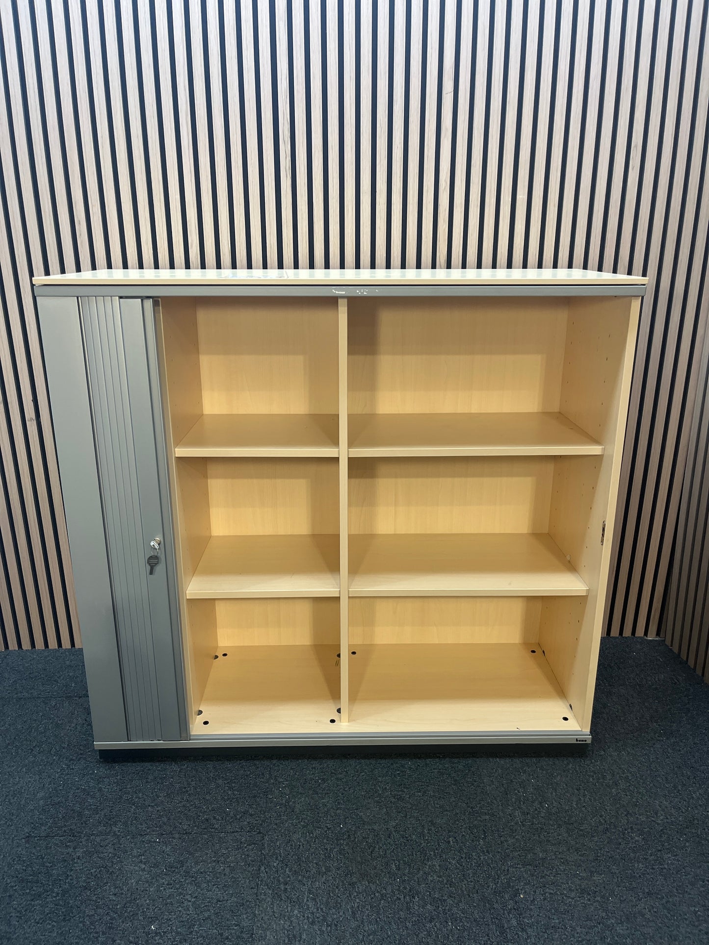 Maple laminate silver framed, side opening tambour with internal shelves (H 113 x W 120 x D 44 cm) J3847
