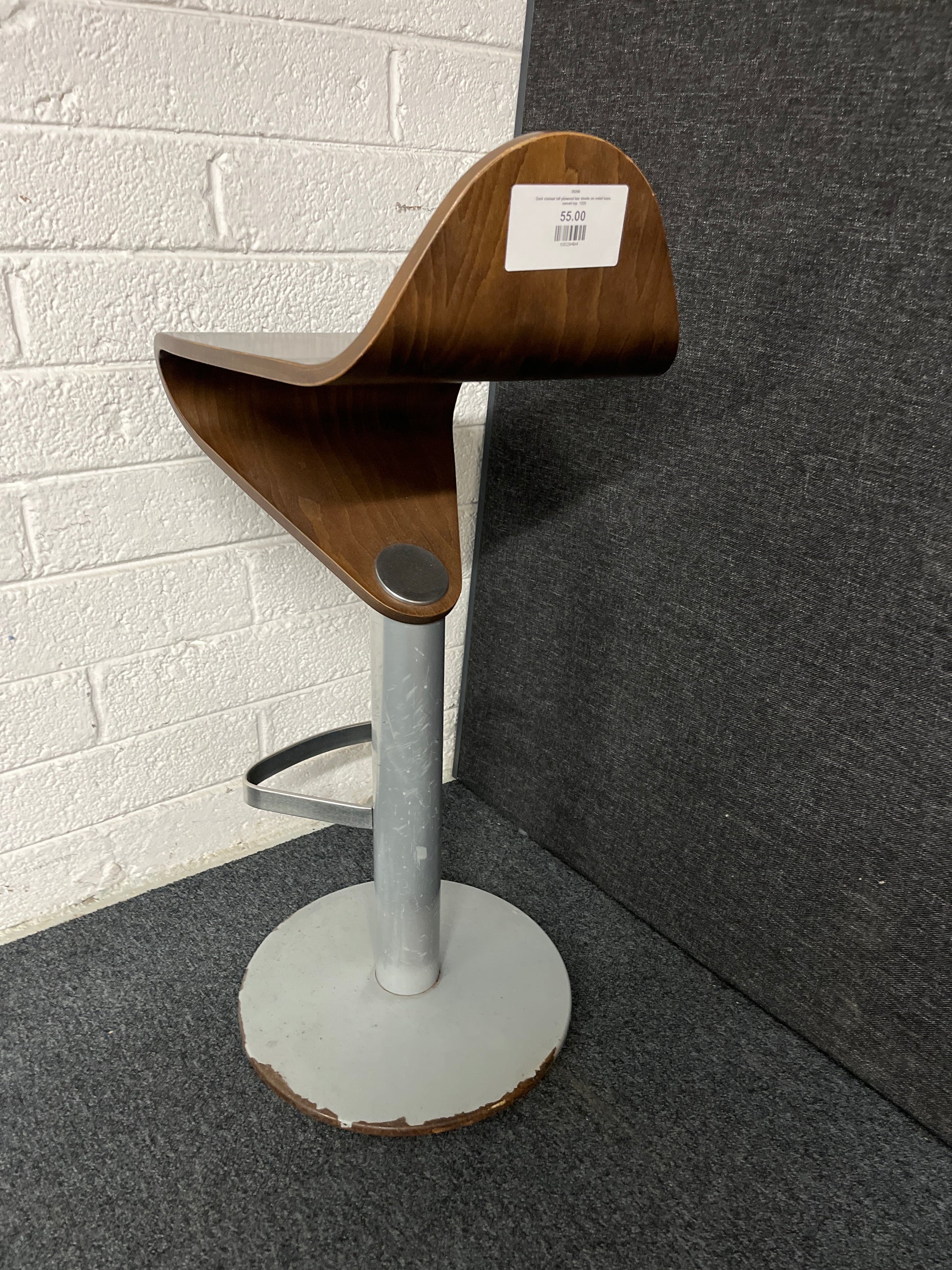 Dark stained tall plywood bar stools on metal base, swivel top  1225