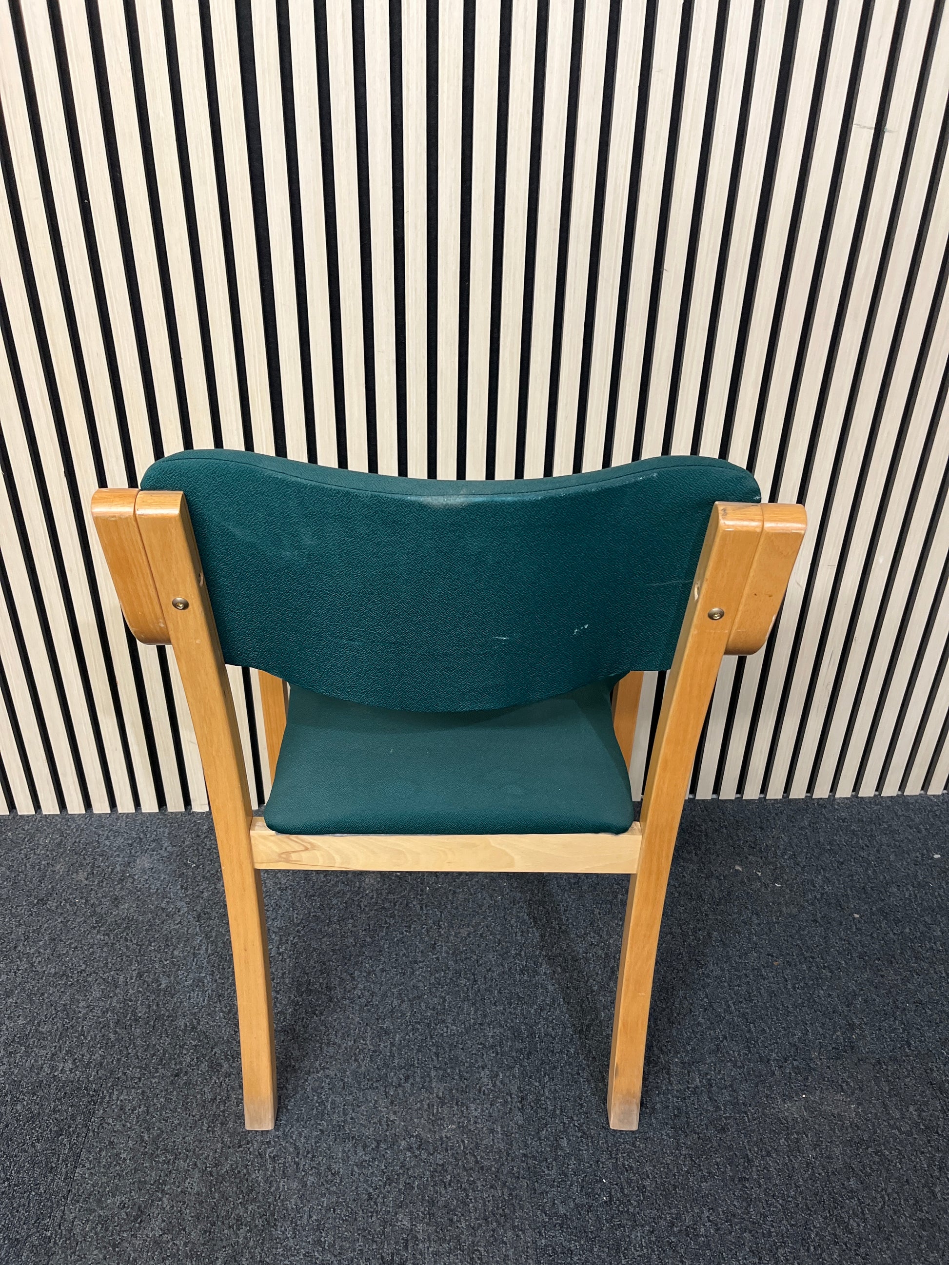 solid beech framed stacking chair with arms, green fabric seat and back