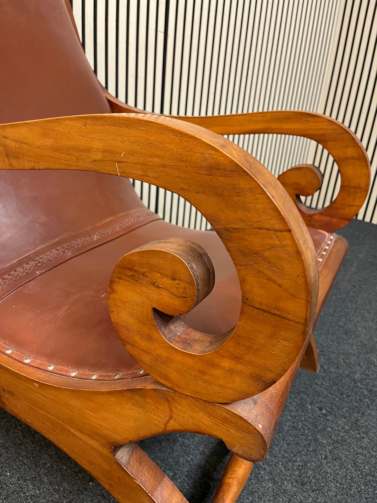 Ornate solid dark wood stained occasional armchair with brown leather studded seat 2425