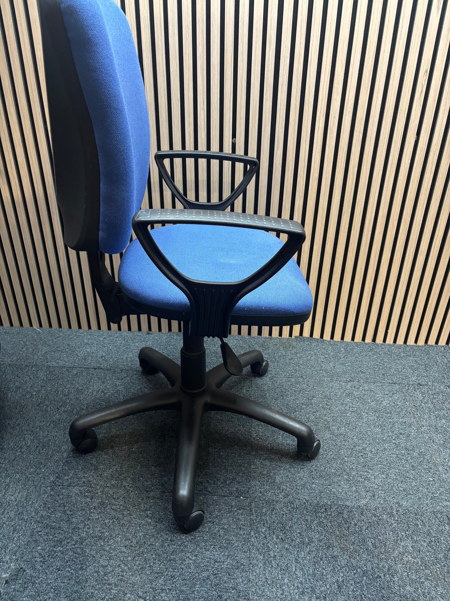 Shaped medium back blue fabric swivel chair with loop arms