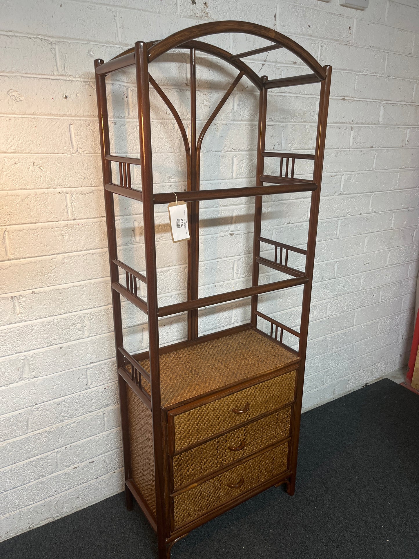 Tall dark cane framed 3 drawer open fronted shelf unit (H 187 x W 69 x D 36 cm) 1325