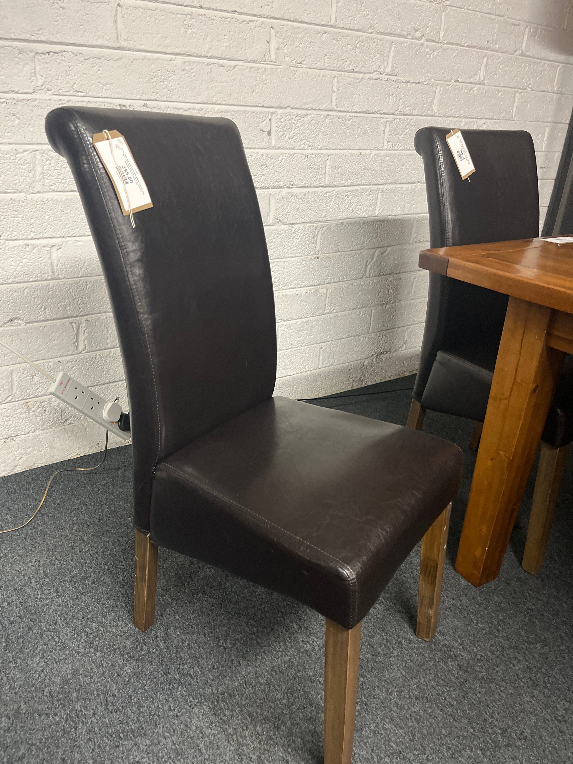 Large solid dark wood extendable kitchen table (W 1200 - 1600 x L 900 mm) with 6 no. high back black PU leatherette dining chairs 1225