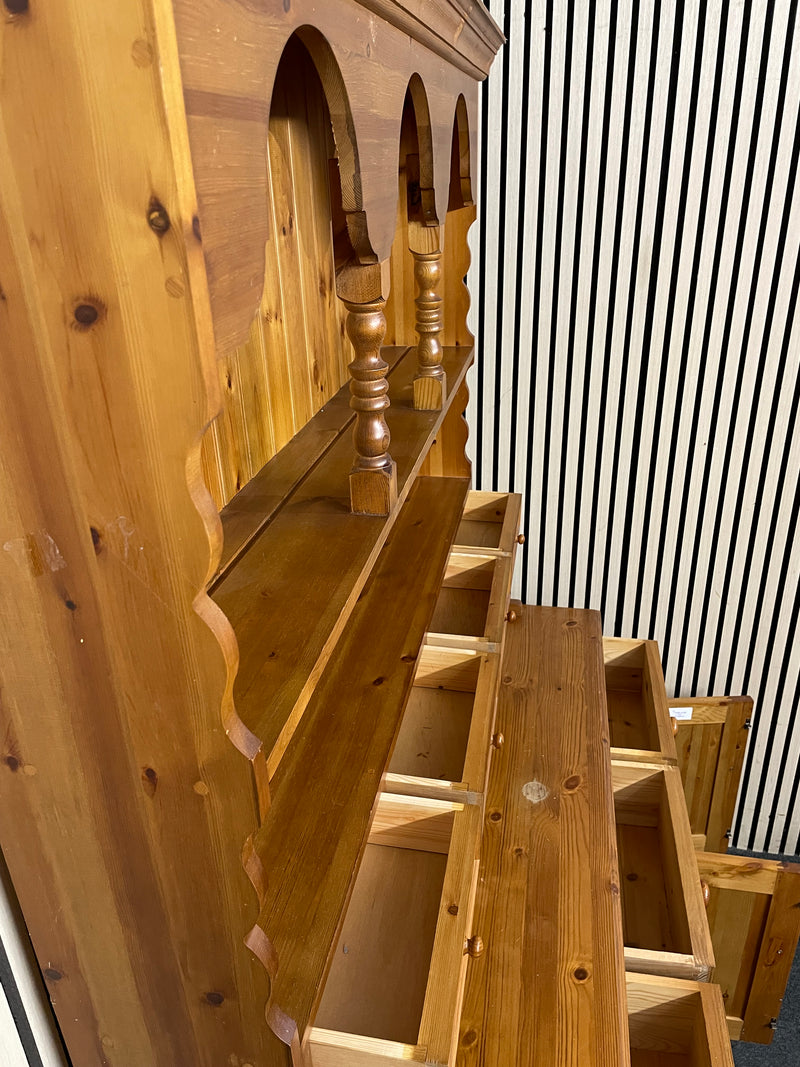 Traditional solid pine dresser with plate racks, drawers, and cupboards.  44495