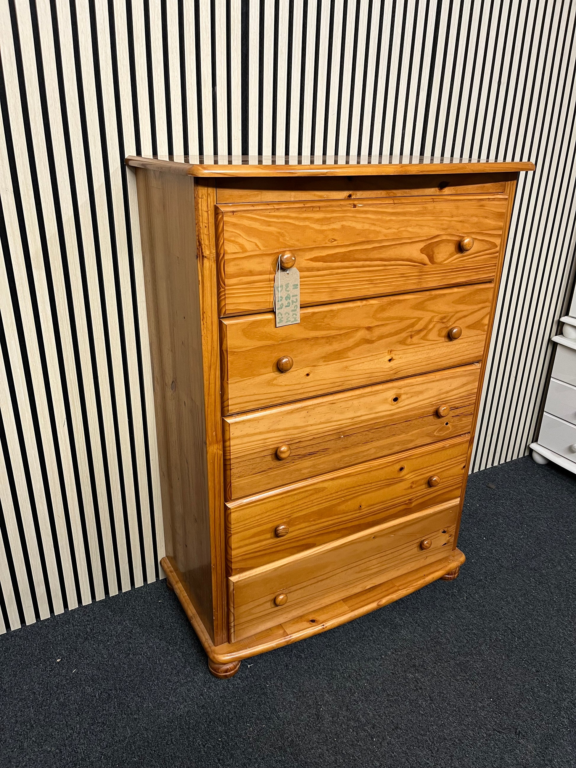 Tall 5 drawer pine chest of drawers with five spacious drawers.