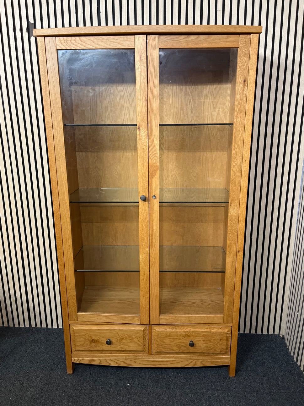 Solid oak display cabinet with glass doors,base drawer and internal lighting (h 183 x w 100 x d 40 cm)  44286