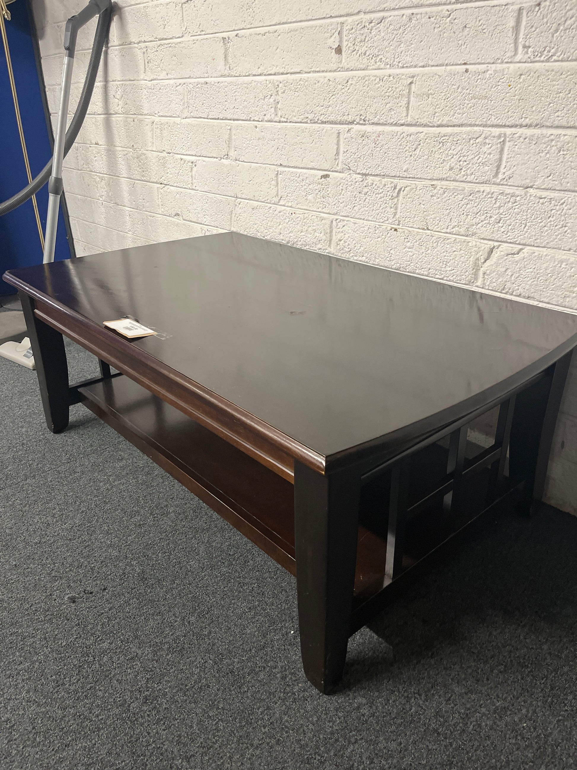 Solid low dark wood stained large rectangular coffee table with drawers (H 53 x W  127 x D 77 cm) 2225
