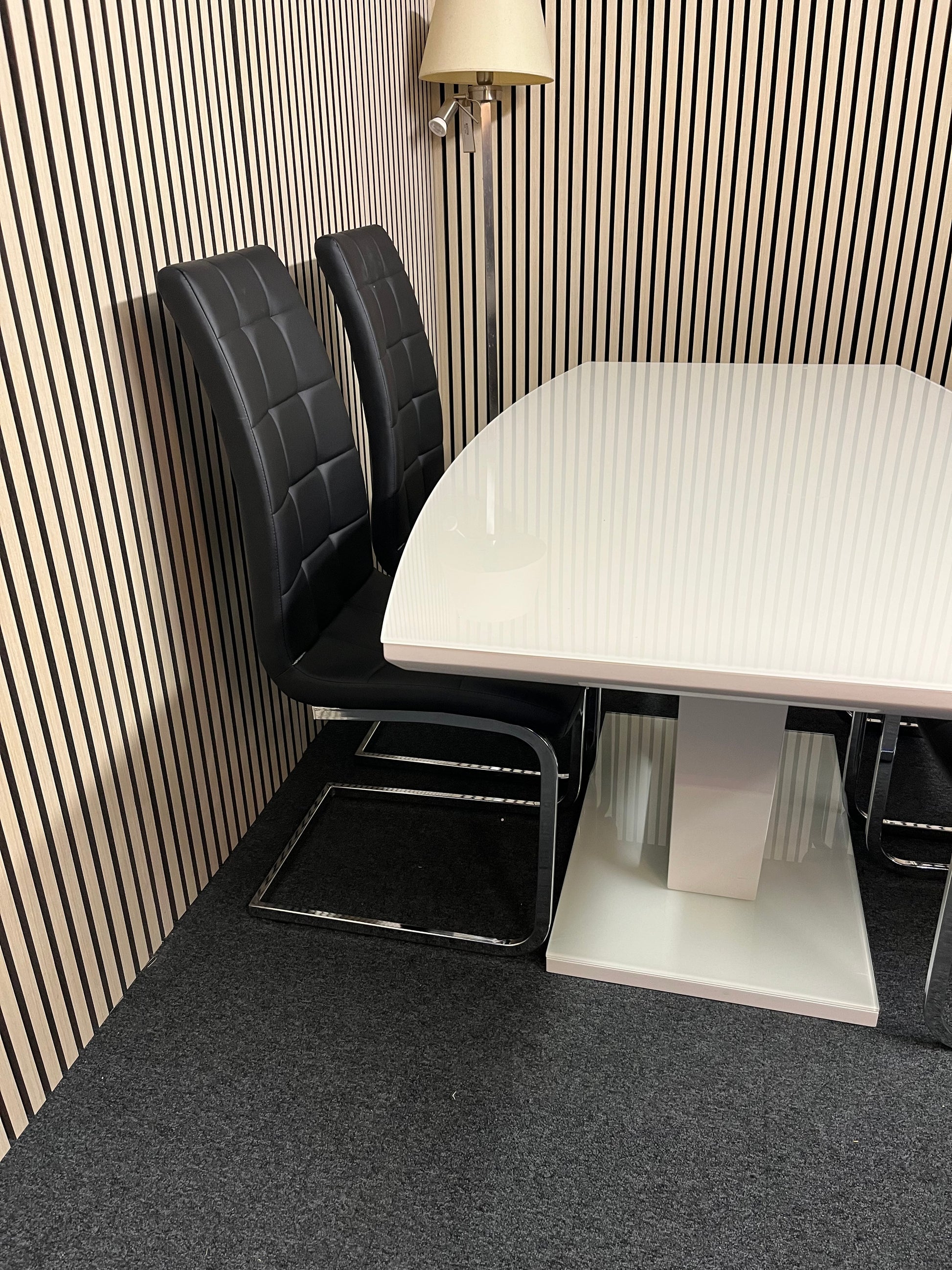 High polished glass modern dining table with 4 no. matching leather cantilever chairs 1325