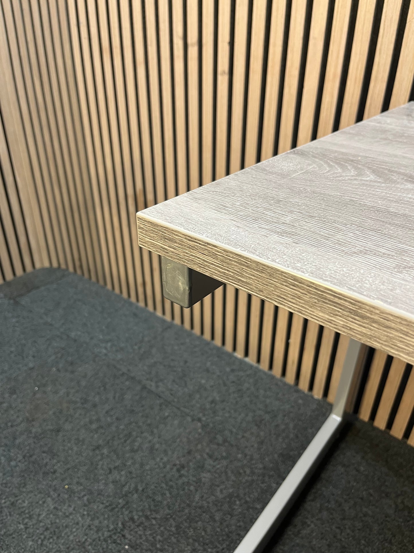 110 x 600 Straight desk  with Grey Oak finish and grey metal cantilever desk