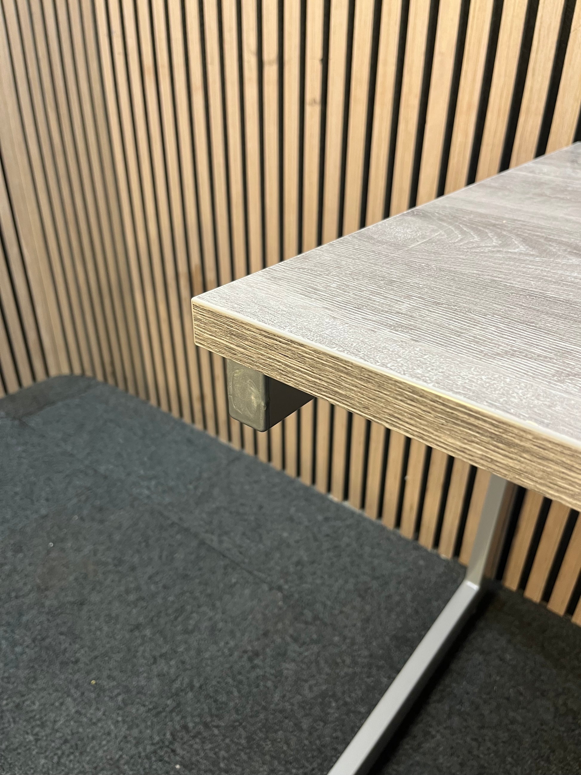 110 x 600 Straight desk  with Grey Oak finish and grey metal cantilever desk