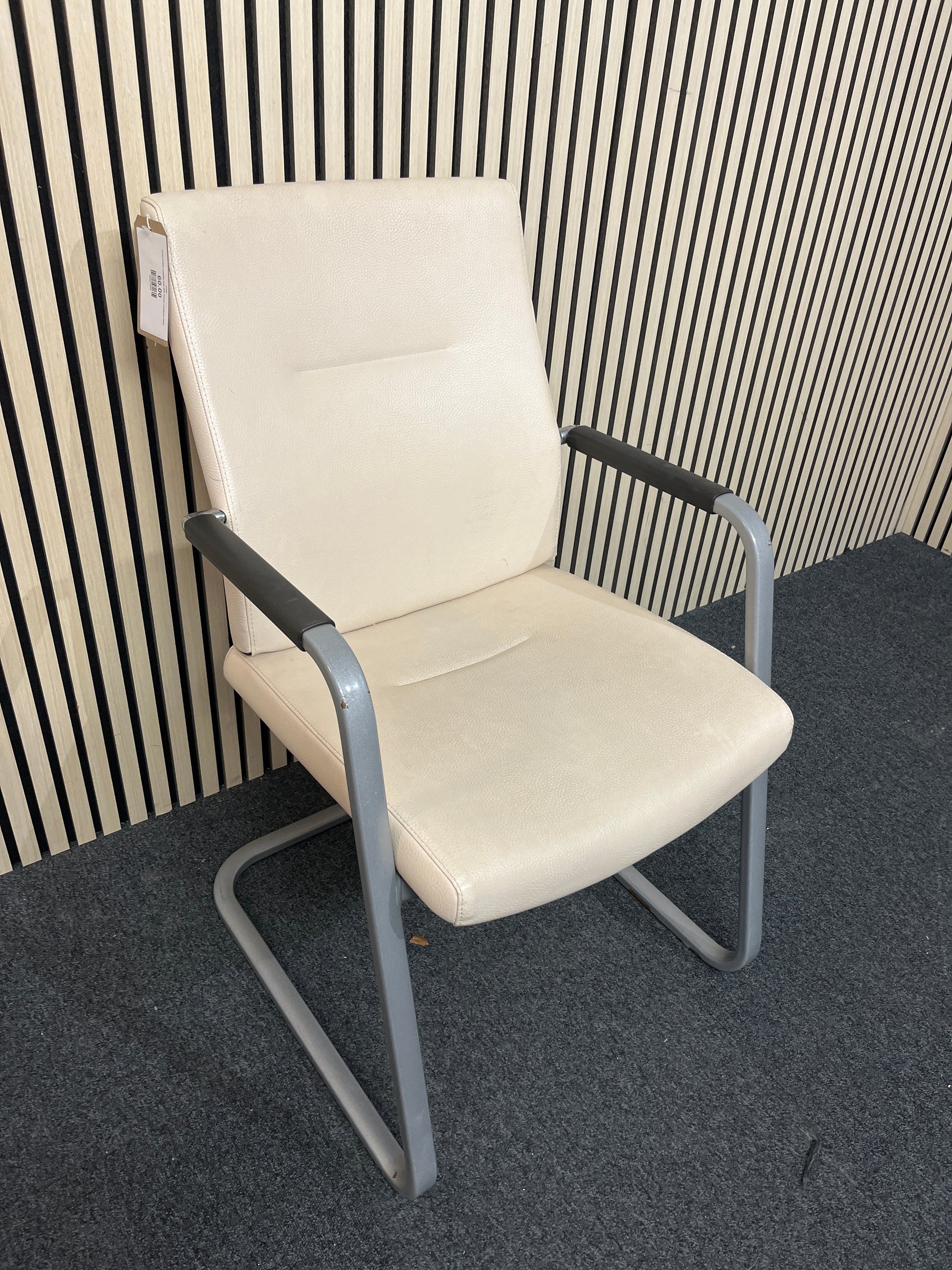 Cream leather meeting chair with chrome canitilever frame