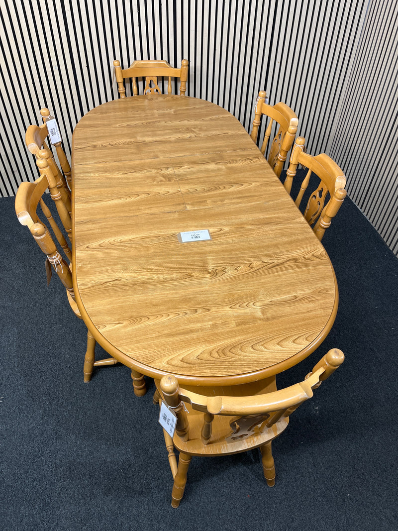 Oak laminate oval extendable dining table with 6 no. matching solid wood chairs W148 to 188 extended x 87D  44459